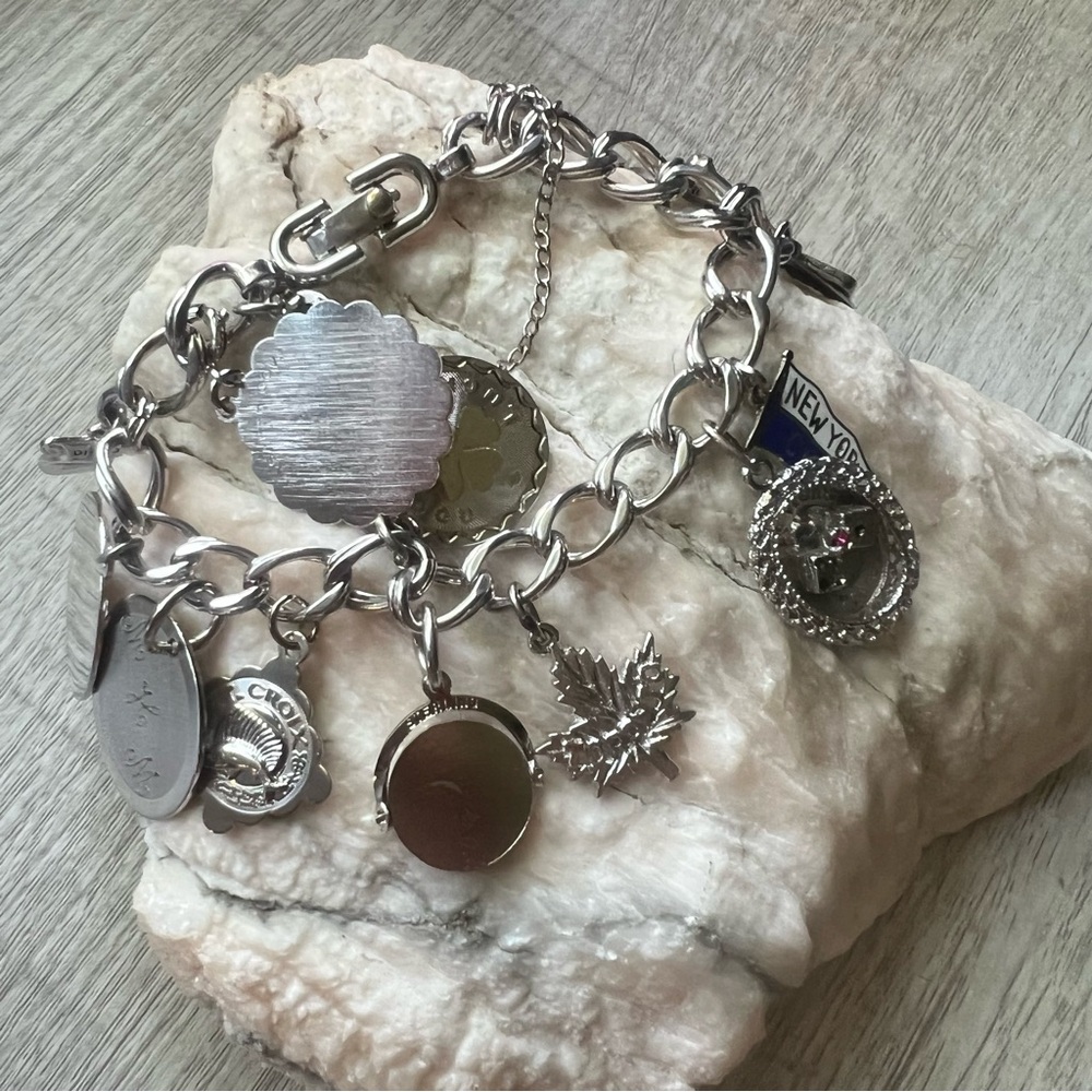 Monet Sterling Silver Vintage Loaded Charm Bracelet. All Sterling Silver charms